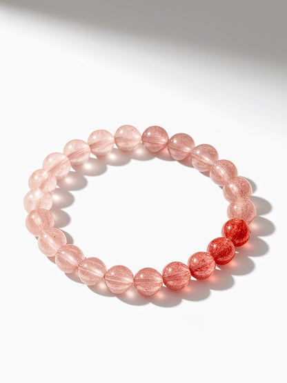 Pink beaded bracelet on a white background