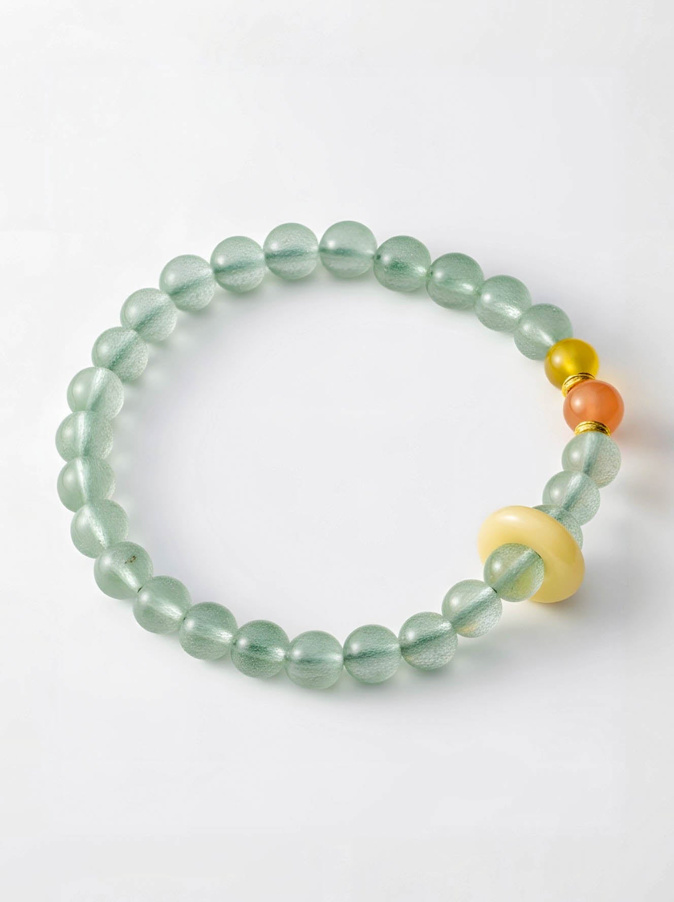 Green beaded bracelet with colorful beads on a white background