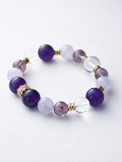 Bracelet with purple and clear beads on a white background